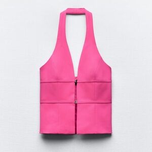 Halter top with buckle closure in front. Brand new with tags.